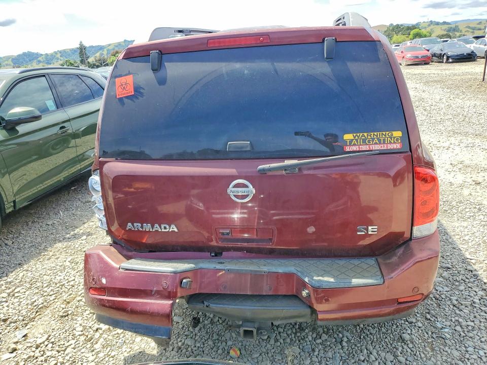 2010 Nissan Armada VIN 5N1AA0ND7AN615013 COPART salvage auction — ROLLOVER, Ca - Non-Repairable Vehicle Cert, sold $225 on 2026-07-09 (photo 6)