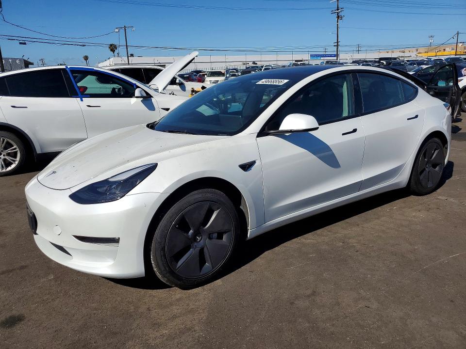 2023 Tesla Model 3 VIN 5YJ3E1EBXPF695517 COPART salvage auction — REAR END, Salvage Title, sold $9,200 on 2026-07-15 (photo 1)