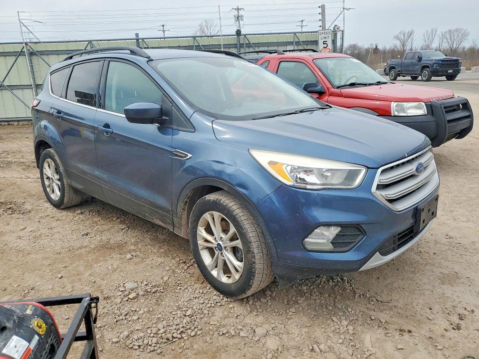 2018 Ford Escape VIN 1FMCU0GD7JUB47786 COPART salvage auction — MINOR DENT/SCRATCHES, Fl - Certificate Of Title, sold $475 on 2026-07-09 (photo 4)