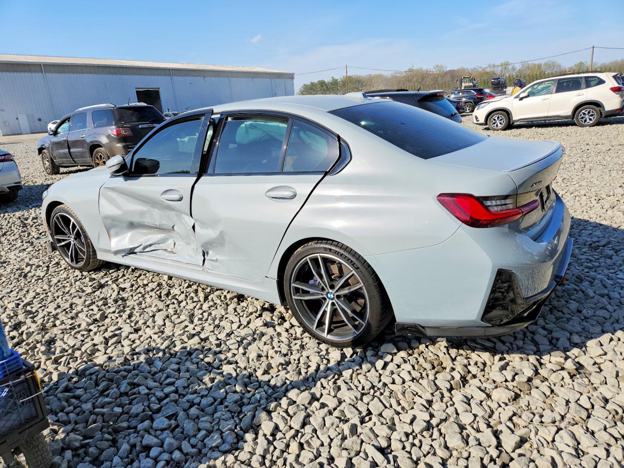 2023 BMW 3 Series VIN 3MW89FF09P8D03052 COPART salvage auction — Side, ID - SALVAGE CERTIFICATE OF TITLE, sold $25,250 on 2026-08-12 (photo 2)