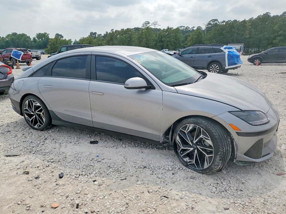 2024 Hyundai Ioniq 6 VIN KMHM34AC5RA066653 COPART salvage auction — SIDE, Tx - Certificate Of Title, sold $14,500 on 2026-07-07 (photo 4)