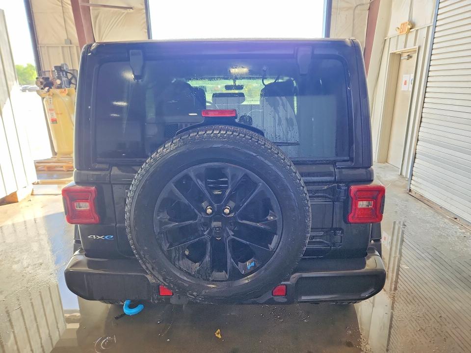 2023 Jeep Wrangler / VIN 1C4JJXP63PW515294 COPART salvage auction — MINOR DENT/SCRATCHES, MO - CERTIFICATE OF TITLE, sold $19,100 on 2026-07-09 (photo 6)