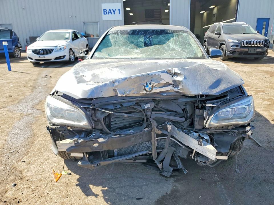 2013 BMW 7er VIN WBAYF8C53DD140398 COPART salvage auction — FRONT END, Il - Salvage Certificate, sold $2,150 on 2026-07-16 (photo 5)