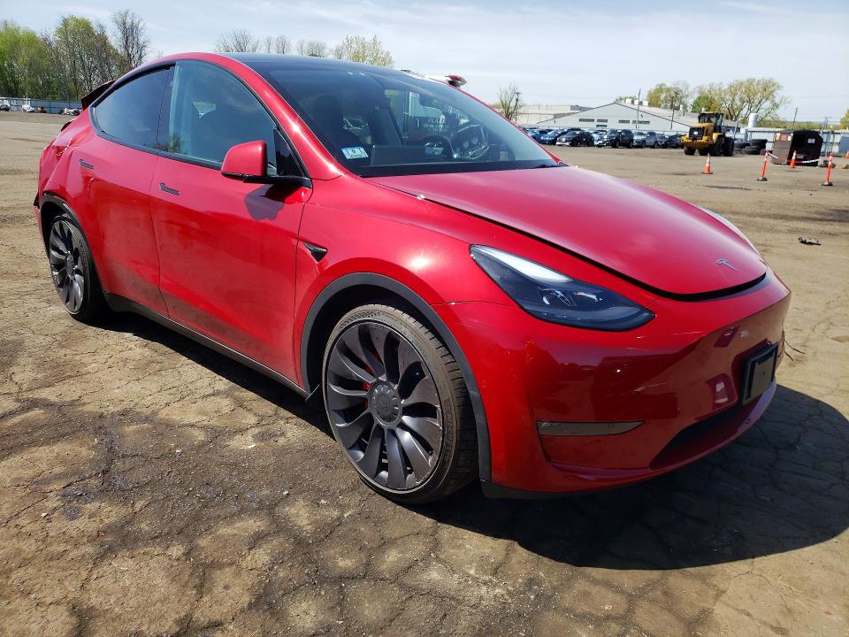 2022 Tesla Model y VIN 7SAYGDEF0NF309773 COPART salvage auction — REAR END, Salvage Title, sold $7,000 on 2026-07-14 (photo 4)