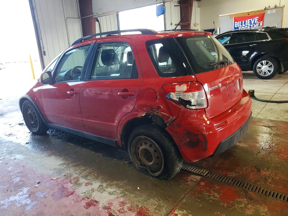 2010 Suzuki Sx4 VIN JS2YB5A36A6300097 COPART salvage auction — REAR END, Ny - Mv-907A Salvage Certificate, sold $475 on 2026-07-06 (photo 2)
