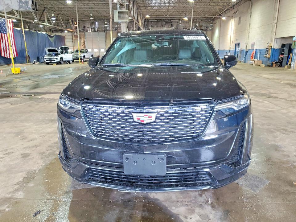 2023 Cadillac Xt6 VIN 1GYKPBR4XPZ120863 COPART salvage auction — SIDE, Mi - Certificate Of Title, sold $12,300 on 2026-08-18 (photo 5)