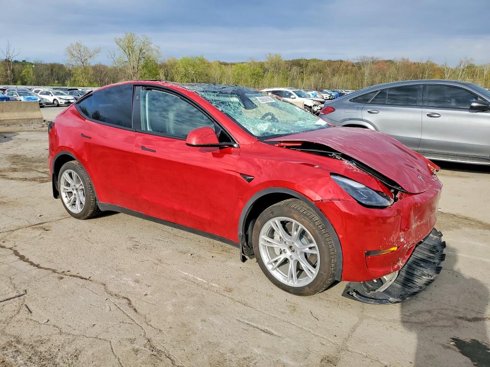 2023 Tesla Model y VIN 7SAYGDEE2PA203851 COPART salvage auction — ROLLOVER, Salvage Title, sold $3,600 on 2026-07-14 (photo 4)