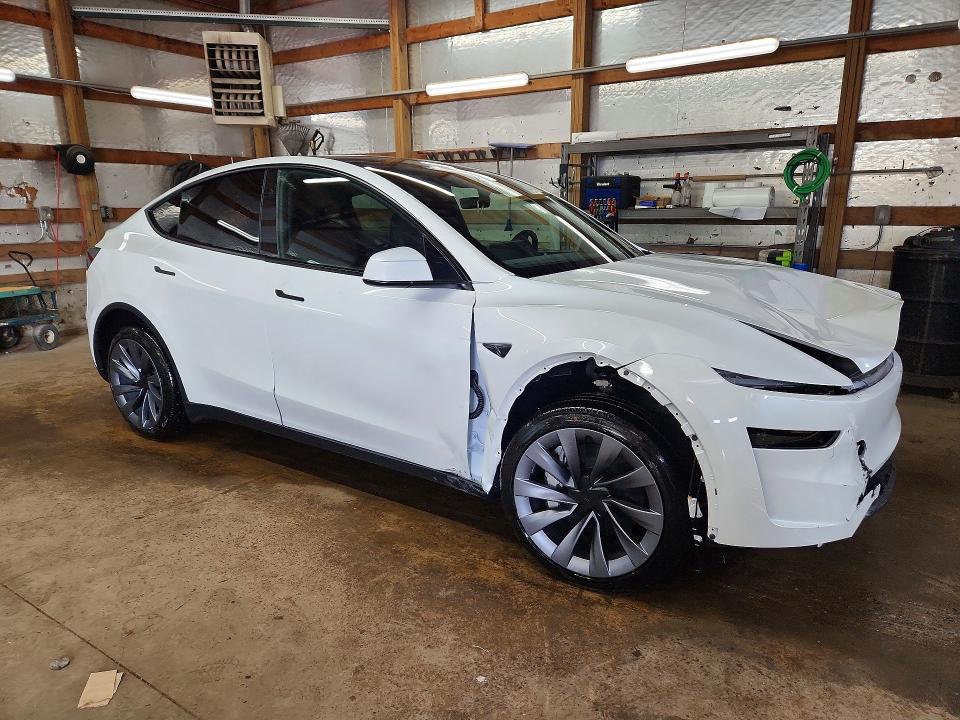2026 Tesla Model y VIN 7SAYGDEEXTF581624 COPART salvage auction — FRONT END, IL - SALVAGE CERTIFICATE, sold $20,500 on 2026-07-06 (photo 4)
