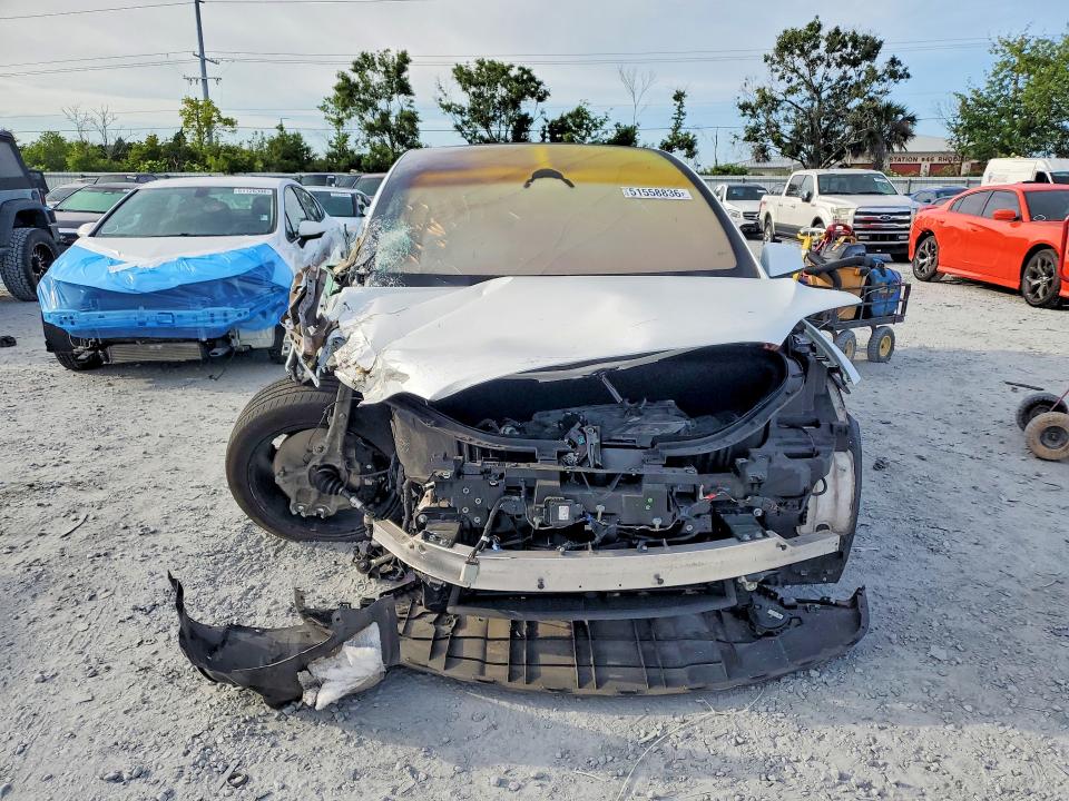 2022 Tesla Model x VIN 7SAXCBE60NF355101 COPART salvage auction — FRONT END, Fl - Cert Of Title Slvg Rebuildable, sold $10,500 on 2026-07-24 (photo 5)