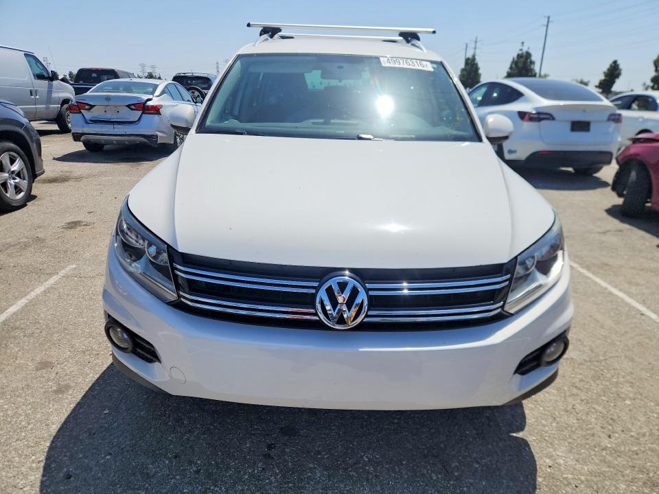 2014 Volkswagen Tiguan VIN WVGAV3AX4EW550496 COPART salvage auction — MECHANICAL, Fl - Derelict Vehicle Certificate (P), sold $4,100 on 2026-07-30 (photo 5)