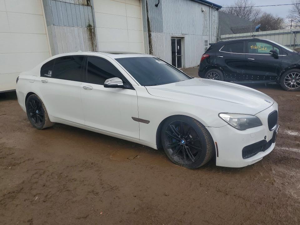 2014 BMW 7 series VIN WBAYE8C59ED135551 COPART salvage auction — UNDERCARRIAGE, Mi - Certificate Of Title, sold $1,650 on 2026-07-22 (photo 4)