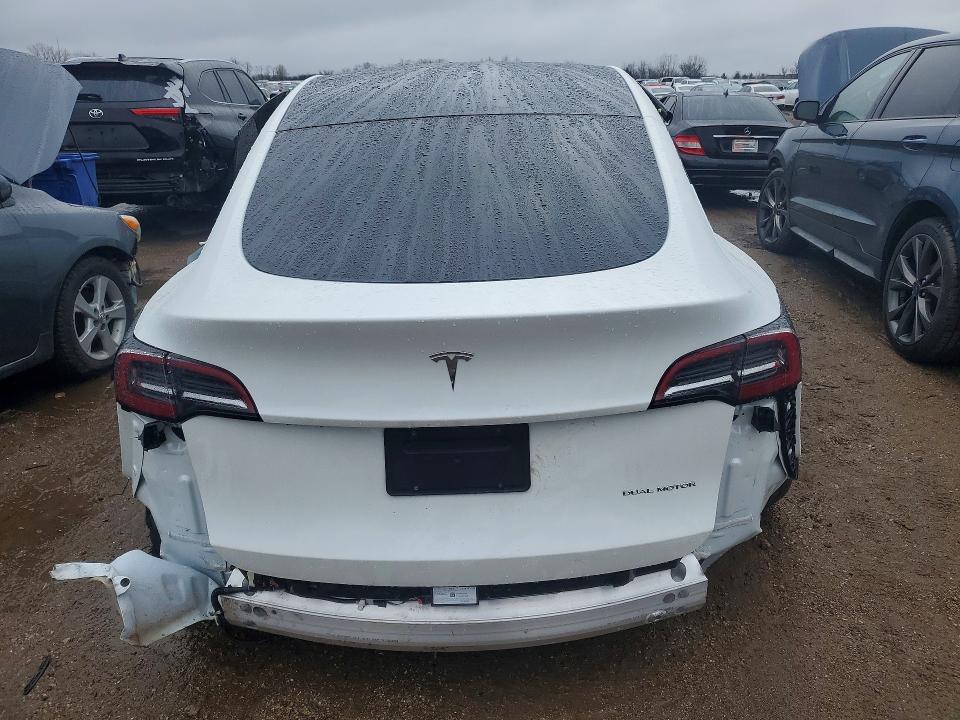 2023 Tesla Model y VIN 7SAYGDEEXPF809921 COPART salvage auction — ALL OVER, Il - Salvage Certificate, sold $1,650 on 2026-07-07 (photo 6)