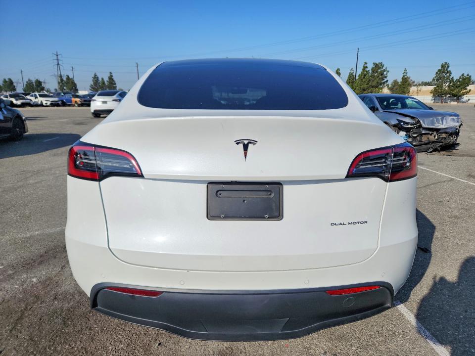 2021 Tesla Model y VIN 5YJYGAEE3MF283963 COPART salvage auction — SIDE, Ca - Salvage Certificate, sold $9,400 on 2026-07-28 (photo 6)