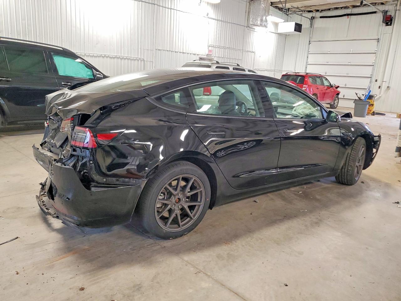 2023 Tesla Model 3 VIN 5YJ3E1EB7PF591423 COPART salvage auction — Rear End, MN - CERT OF TITLE-SALVAGE, sold $3,350 on 2026-05-28 (photo 3)