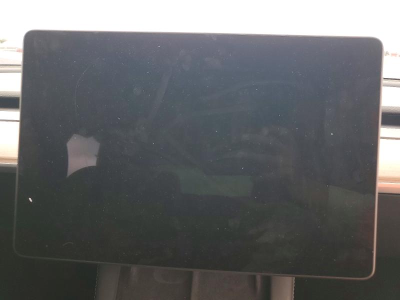 2023 Tesla Model 3 VIN 5YJ3E1EA4PF695178 COPART salvage auction — SIDE, TX - SALVAGE VEHICLE TITLE, sold $3,450 on 2026-07-02 (photo 9)