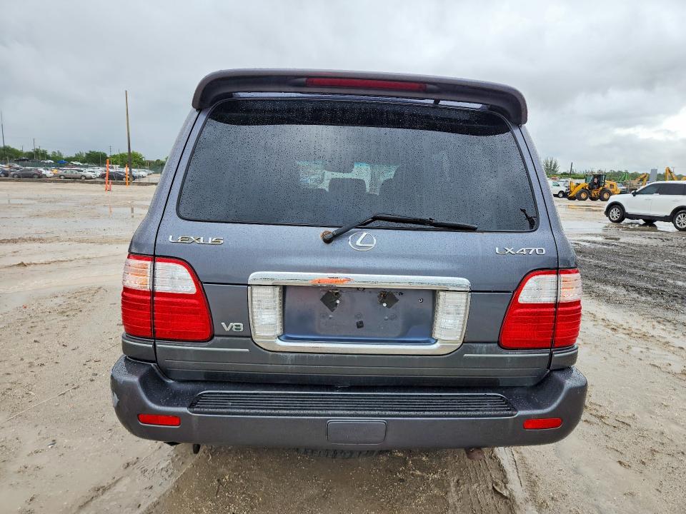2004 Lexus Lx 470 VIN JTJHT00W943547090 COPART salvage auction — REAR END, Fl - Certificate Of Title (P), sold $11,400 on 2026-07-07 (photo 6)