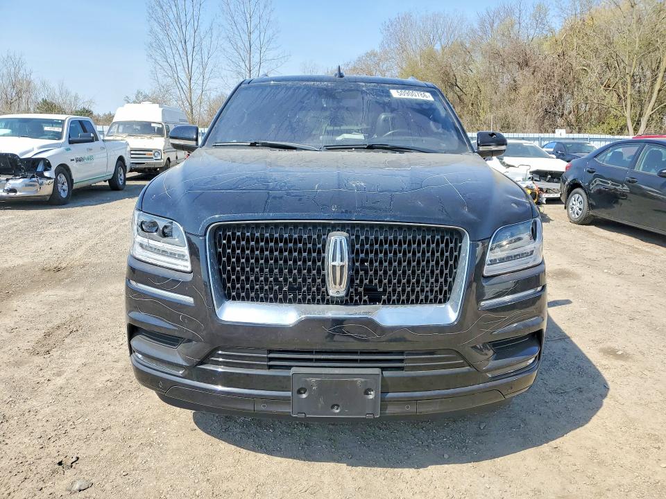 2020 Lincoln Navigator VIN 5LMJJ2LT5LEL10938 COPART salvage auction — VANDALISM, On - Permit No Brand - Unfit, sold $17,100 on 2026-07-08 (photo 5)