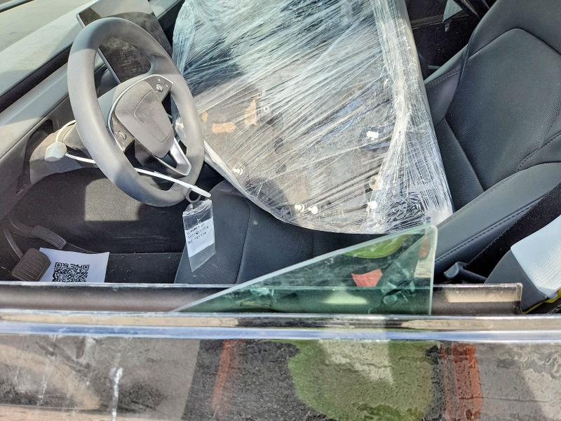 2026 Tesla Model y VIN 7SAYGDED0TF383478 COPART salvage auction — SIDE, Ut - Salvage Certificate, sold $14,900 on 2026-07-31 (photo 7)