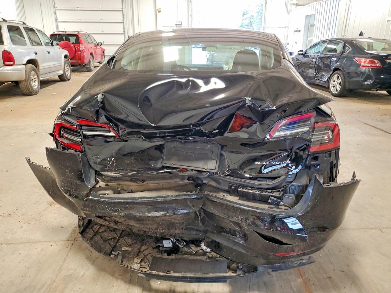 2023 Tesla Model 3 VIN 5YJ3E1EB7PF591423 COPART salvage auction — Rear End, MN - CERT OF TITLE-SALVAGE, sold $3,350 on 2026-05-28 (photo 6)
