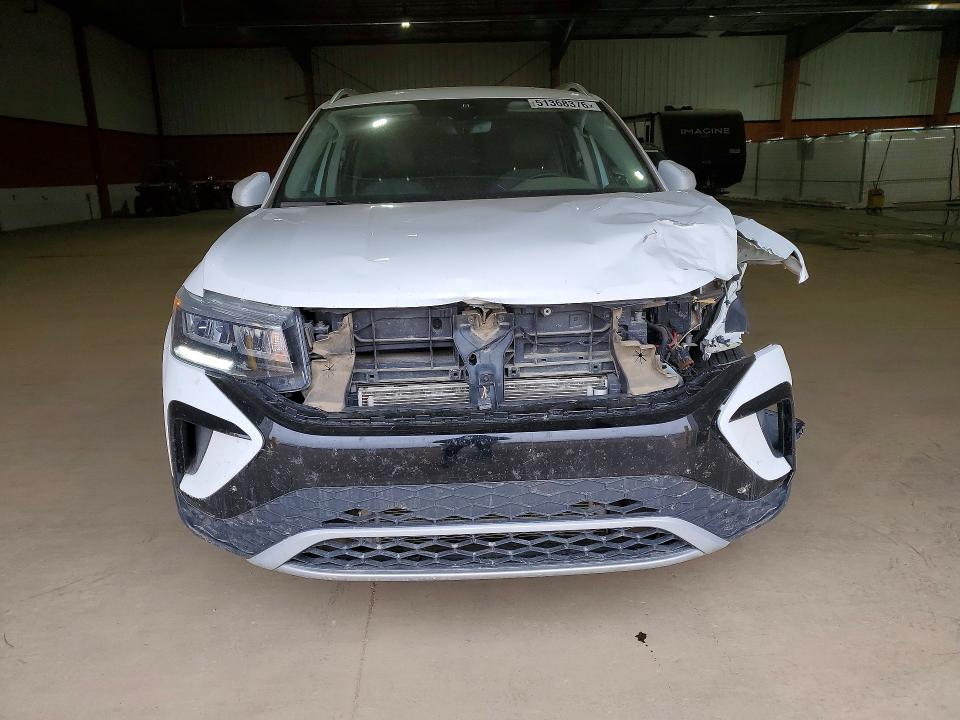 2024 Volkswagen Taos VIN 3VVSX7B28RM007060 COPART salvage auction — SIDE, Ab - Bos - Salvage, sold $11,000 on 2026-07-21 (photo 5)