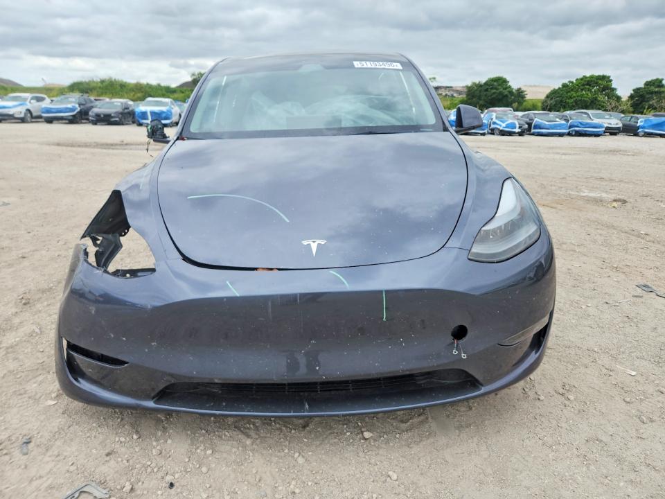 2023 Tesla Model y VIN 7SAYGDEE6PF923950 COPART salvage auction — FRONT END, Salvage Title, sold $1,800 on 2026-07-28 (photo 5)