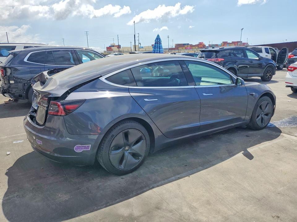2019 Tesla Model 3 VIN 5YJ3E1EAXKF396366 COPART salvage auction — REAR END, CA - SALVAGE CERTIFICATE, sold $5,700 on 2026-07-29 (photo 3)