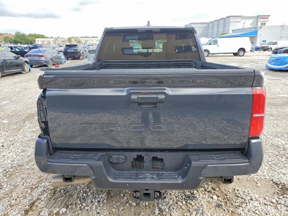 2026 Toyota Tacoma VIN 3TMKB5FN2TM059880 COPART salvage auction — SIDE, Fl - Cert Of Title Slvg Rebuildable, sold $16,700 on 2026-07-02 (photo 6)