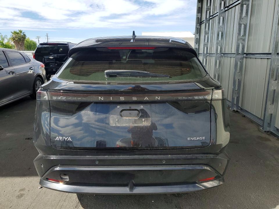 2023 Nissan Ariya VIN JN1AF0BA4PM407219 COPART salvage auction — SIDE, CA - SALVAGE CERTIFICATE, sold $7,700 on 2026-07-09 (photo 6)