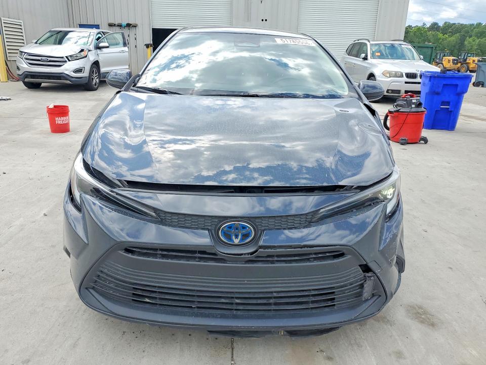 2023 Toyota Corolla VIN JTDBCMFE9P3013574 COPART salvage auction — FRONT END, Fl - Certificate Of Destruction, sold $6,800 on 2026-07-09 (photo 5)