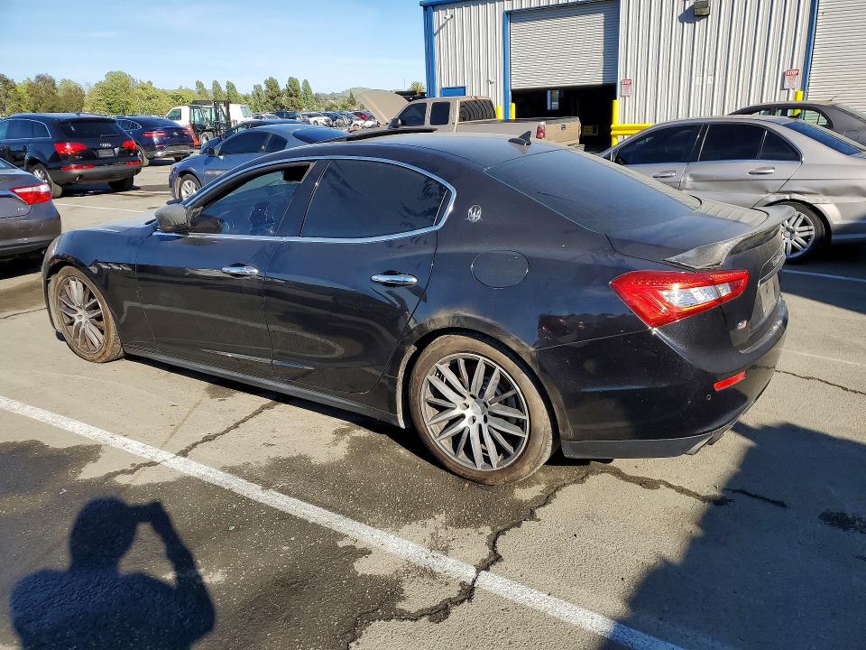 2014 Maserati Ghibli VIN ZAM57RTA9E1085914 COPART salvage auction — SIDE, Fl - Dis/Dlr/Exp Only Clean Title, sold $2,100 on 2026-07-31 (photo 2)