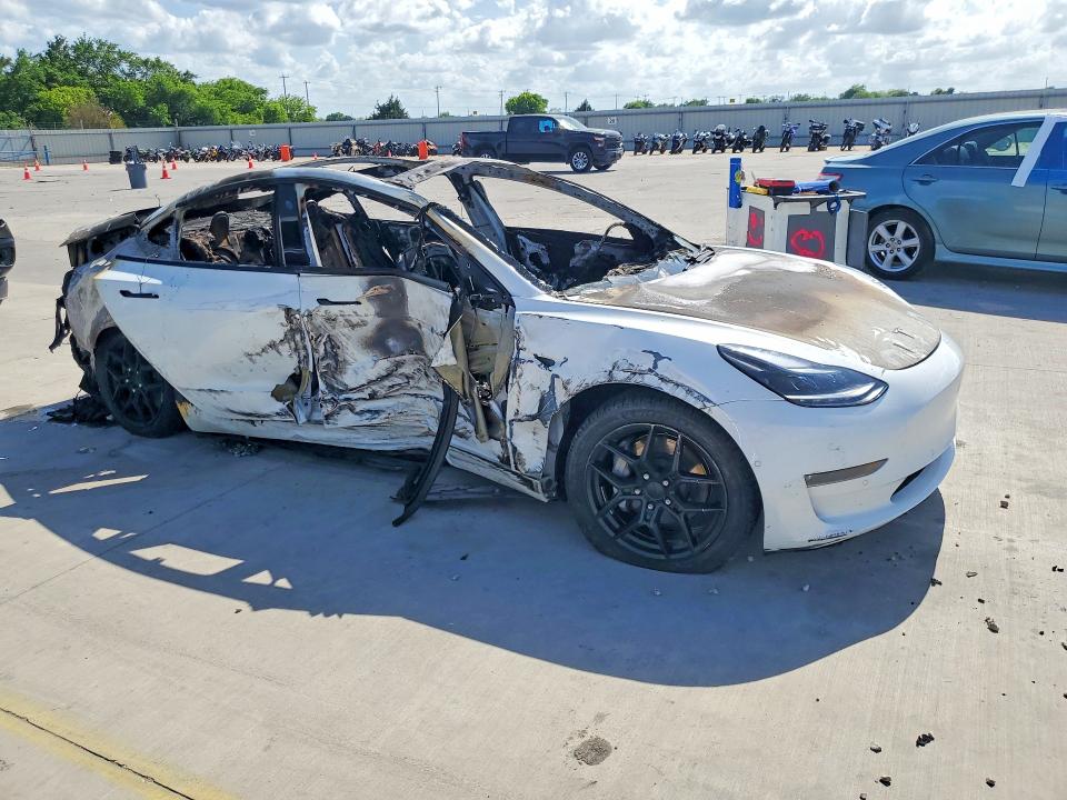 2021 Tesla Model 3 VIN 5YJ3E1EB9MF927150 COPART salvage auction — BURN, Tx - Nonrepairable Title, sold $325 on 2026-07-06 (photo 4)