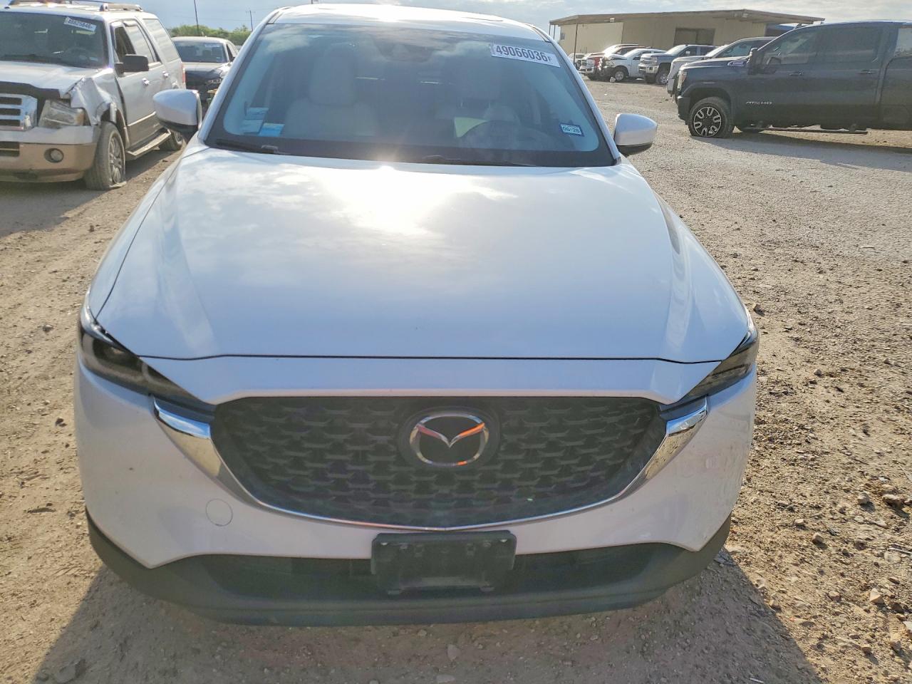 2023 Mazda CX-5 VIN JM3KFBEM3P0211144 COPART salvage auction — Minor Dent/Scratches, TX - SALVAGE VEHICLE TITLE, sold $9,800 on 2026-07-02 (photo 5)