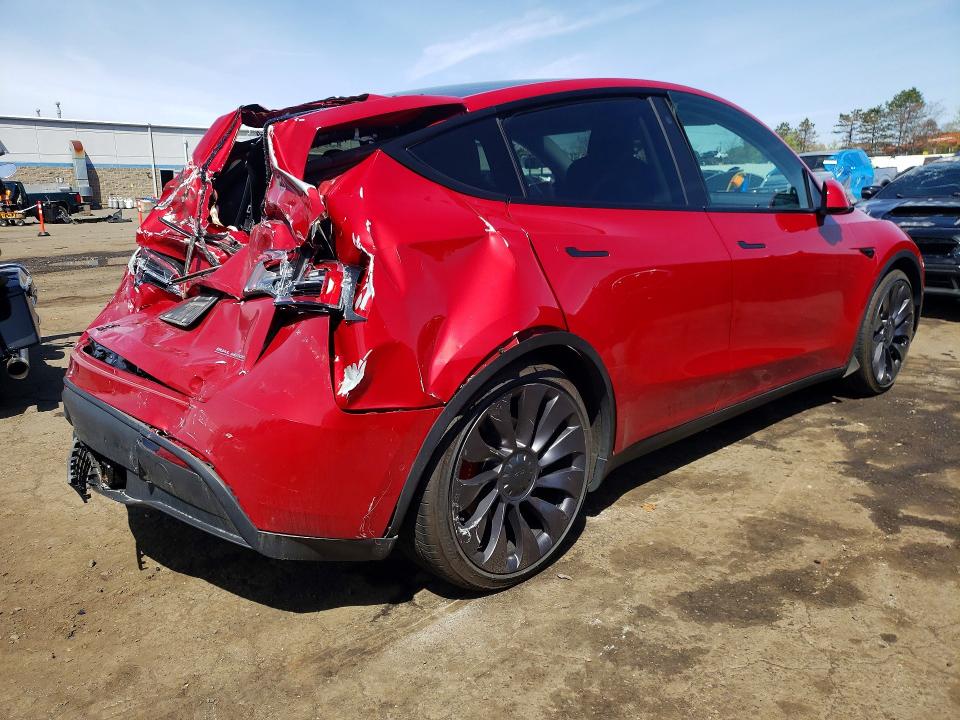 2022 Tesla Model y VIN 7SAYGDEF0NF309773 COPART salvage auction — REAR END, Salvage Title, sold $7,000 on 2026-07-14 (photo 3)