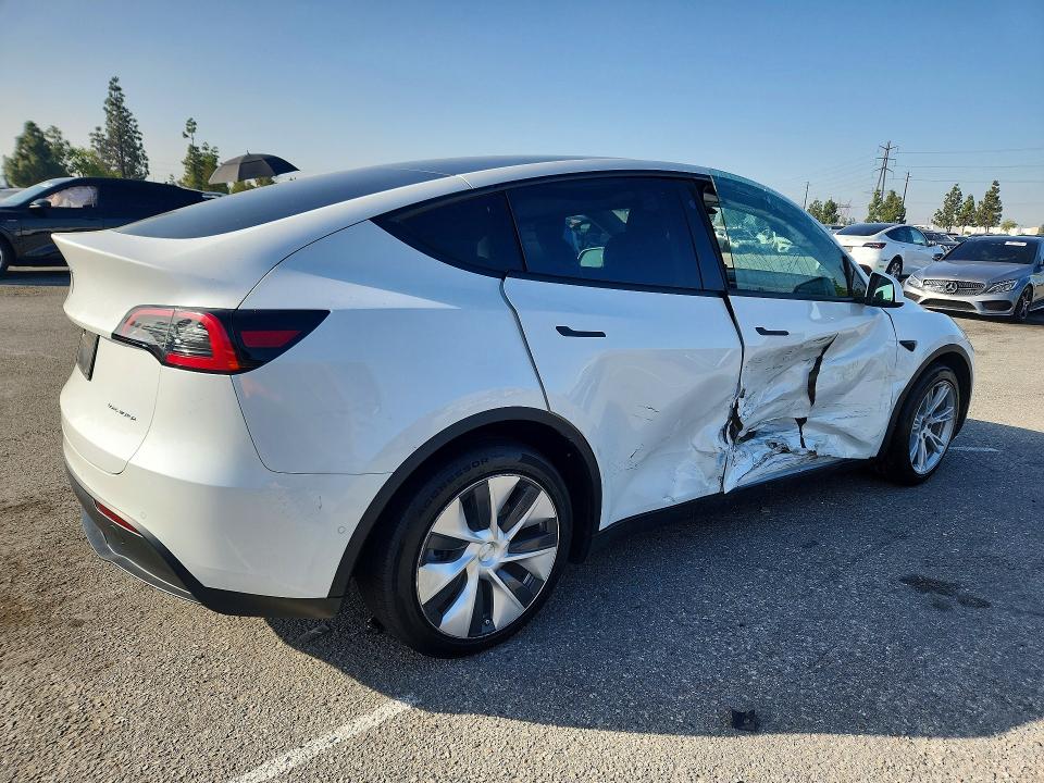 2021 Tesla Model y VIN 5YJYGAEE3MF283963 COPART salvage auction — SIDE, Ca - Salvage Certificate, sold $9,400 on 2026-07-28 (photo 3)