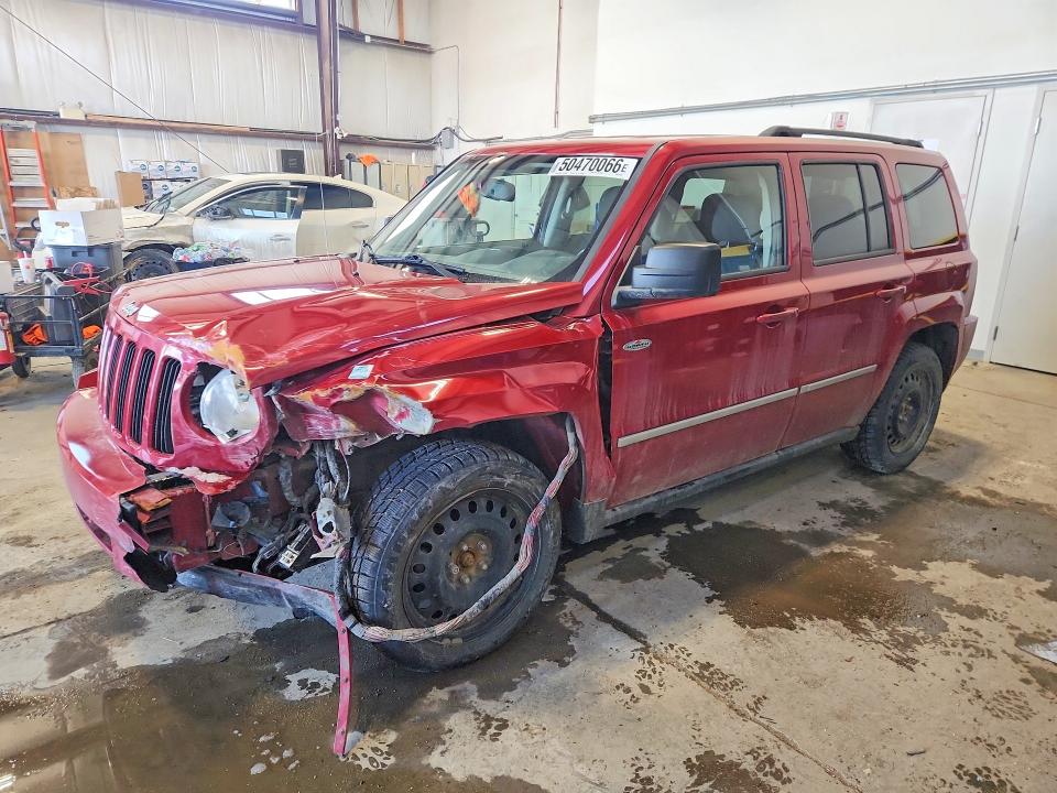 2010 Jeep Patriot VIN 1J4NF2GBXAD631561 — COPART salvage auction photo