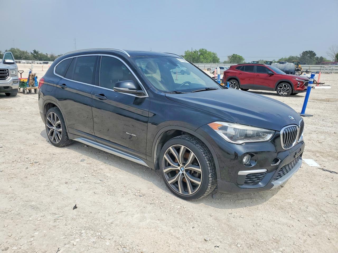 2017 BMW X1 VIN WBXHT3C35H5F75779 COPART salvage auction — Minor Dent/Scratches, TX - CERTIFICATE OF TITLE, sold $4,400 on 2026-07-09 (photo 4)