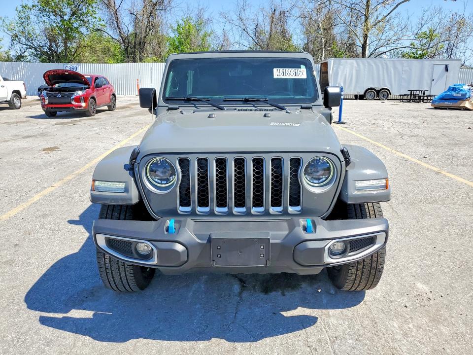 2023 Jeep Wrangler / VIN 1C4JJXP69PW604562 COPART salvage auction — MINOR DENT/SCRATCHES, MO - CERTIFICATE OF TITLE, sold $18,900 on 2026-07-09 (photo 5)