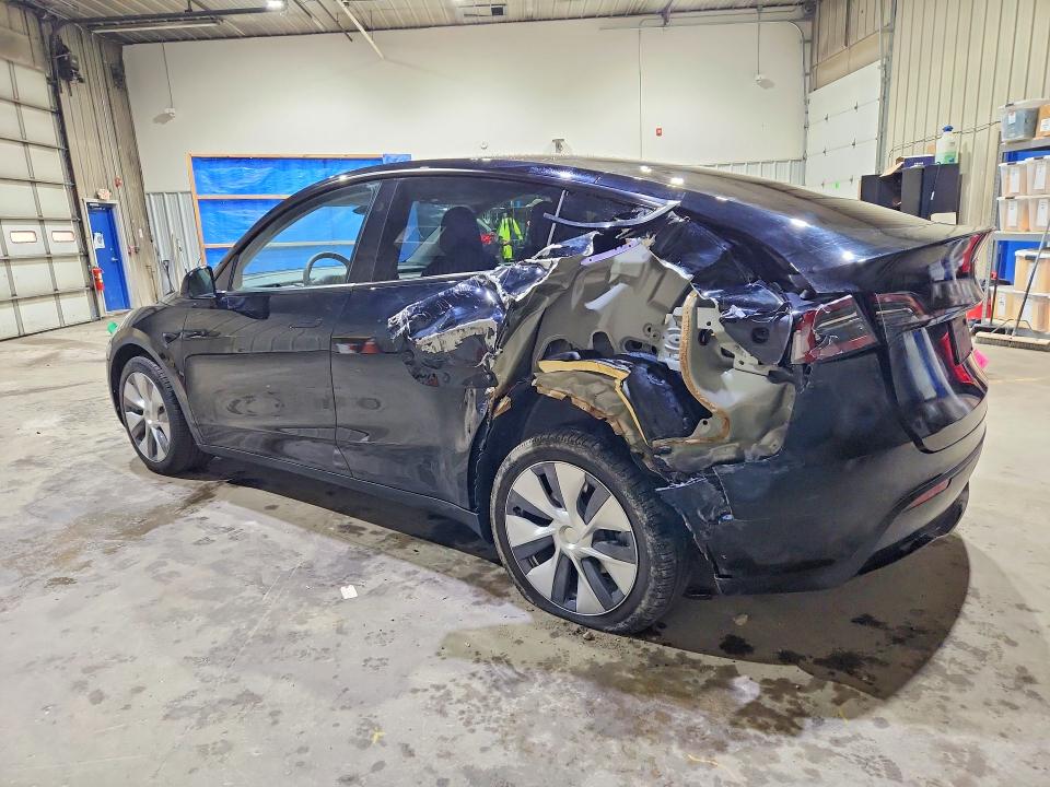 2023 Tesla Model y VIN 7SAYGDEE9PA187003 COPART salvage auction — REAR END, Nh - Cert Of Title-Salvage, sold $10,600 on 2026-07-07 (photo 2)