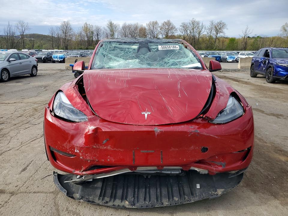 2023 Tesla Model y VIN 7SAYGDEE2PA203851 COPART salvage auction — ROLLOVER, Salvage Title, sold $3,600 on 2026-07-14 (photo 5)