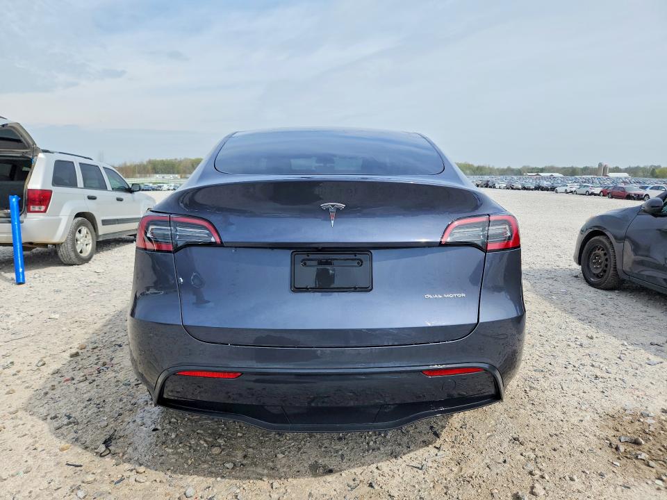 2023 Tesla Model y VIN 7SAYGDEE0PF695489 COPART salvage auction — FRONT END, MI, sold $13,800 on 2026-07-23 (photo 6)