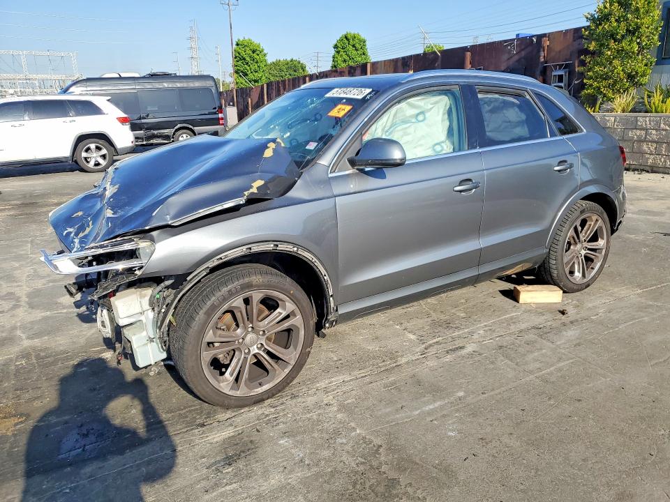 2015 Audi Q3 VIN WA1EFCFS4FR002542 COPART salvage auction — FRONT END, Salvage Title, sold $500 on 2026-07-22 (photo 1)