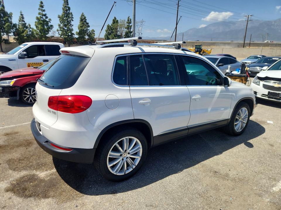 2014 Volkswagen Tiguan VIN WVGAV3AX4EW550496 COPART salvage auction — MECHANICAL, Fl - Derelict Vehicle Certificate (P), sold $4,100 on 2026-07-09 (photo 3)