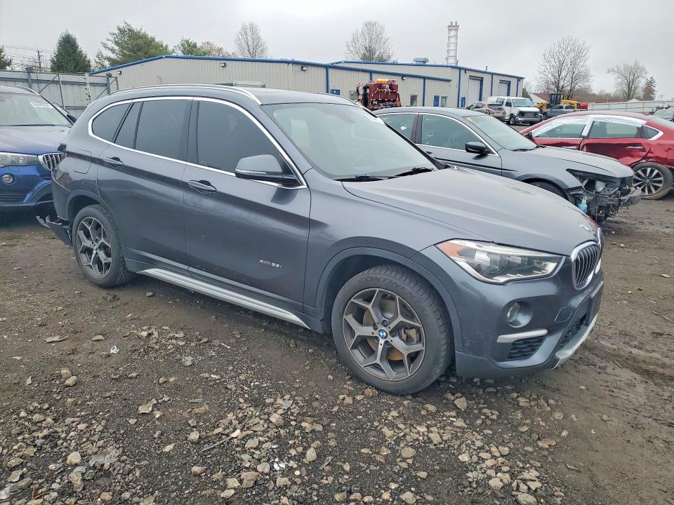 2017 BMW X1 VIN WBXHT3Z33H4A54010 COPART salvage auction — REAR END, Md - Cert Of Salvage > 75% Damage, sold $1,900 on 2026-07-20 (photo 4)