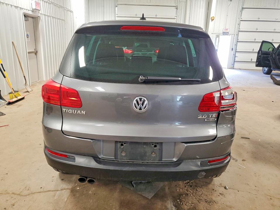 2014 Volkswagen Tiguan VIN WVGBV3AX6EW543358 COPART salvage auction — SIDE, Mn - Cert Of Title-Prior Salvage, sold $525 on 2026-07-14 (photo 6)