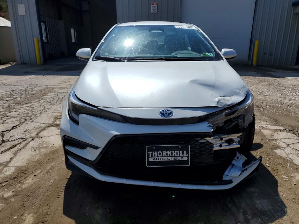 2023 Toyota Corolla VIN JTDBDMHE1PJ003496 COPART salvage auction — FRONT END, Salvage Title, sold $675 on 2026-07-23 (photo 5)