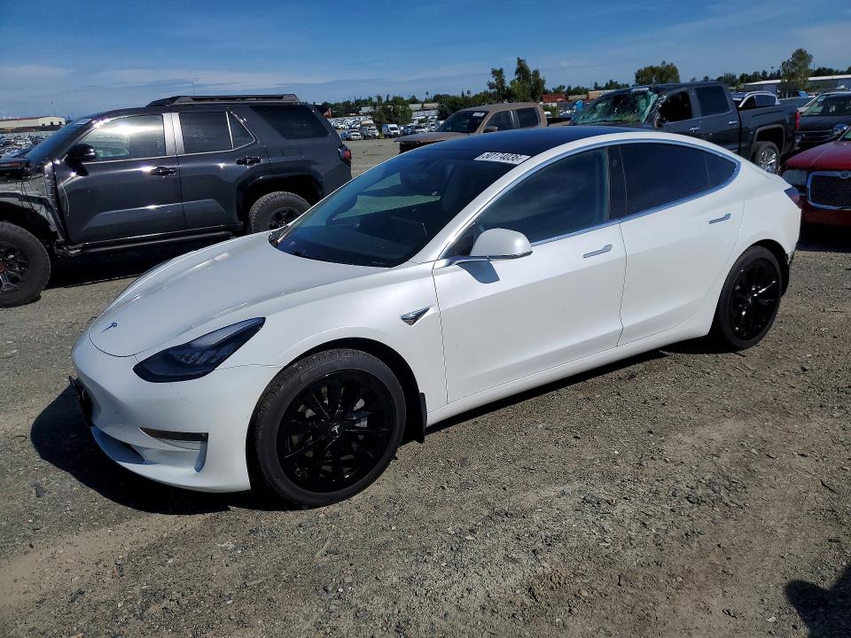 2019 Tesla Model 3 VIN 5YJ3E1EB1KF512434 — COPART salvage auction photo