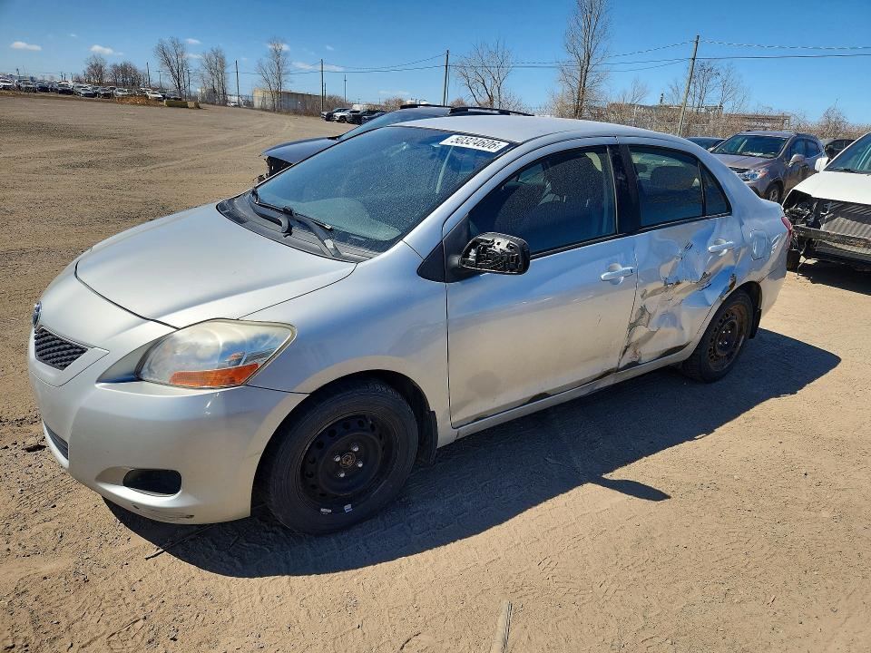 2010 Toyota Yaris VIN JTDBT4K39A1362872 COPART salvage auction — SIDE, Qc - Gravement Accidente, sold $1,450 on 2026-07-21 (photo 1)