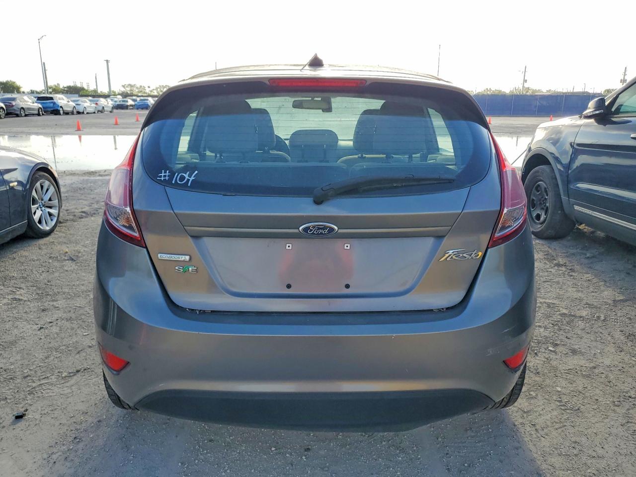 2014 Ford Fiesta VIN 3FADP4EE6EM216034 COPART salvage auction — Minor Dent/Scratches, FL - CERTIFICATE OF TITLE, sold $275 on 2026-07-01 (photo 6)
