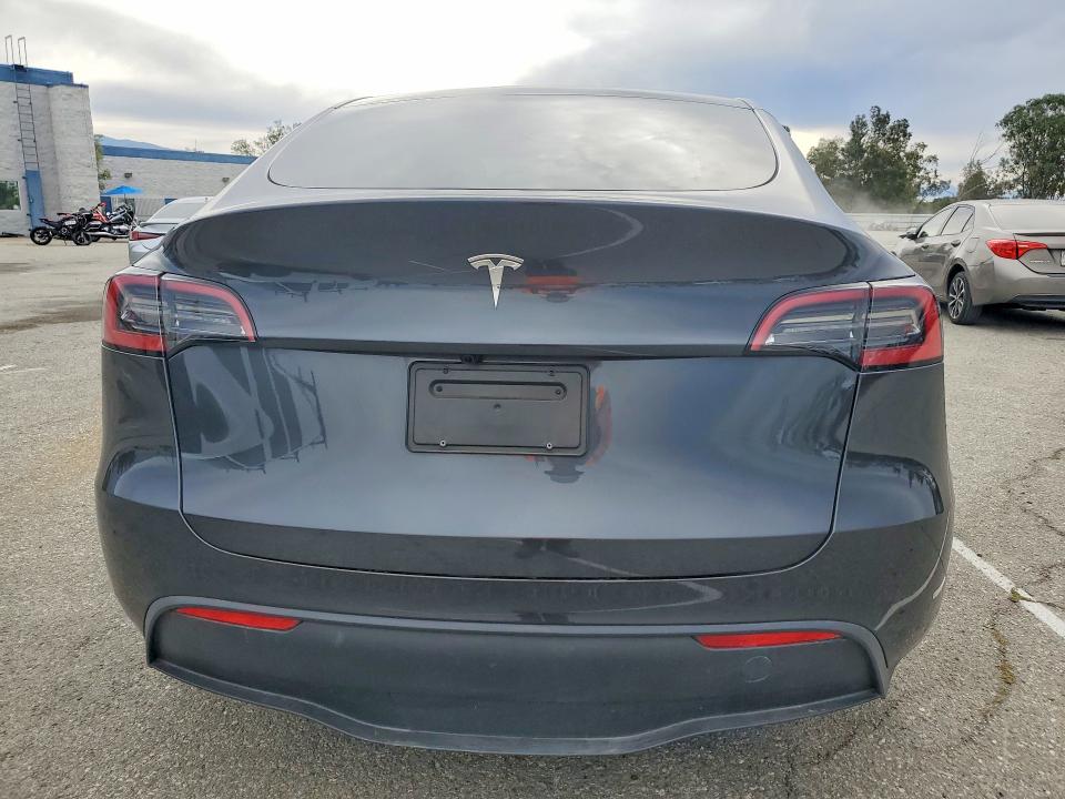 2025 Tesla Model y VIN 7SAYGDED1SF278317 COPART salvage auction — FRONT END, CA, sold $8,600 on 2026-07-28 (photo 6)