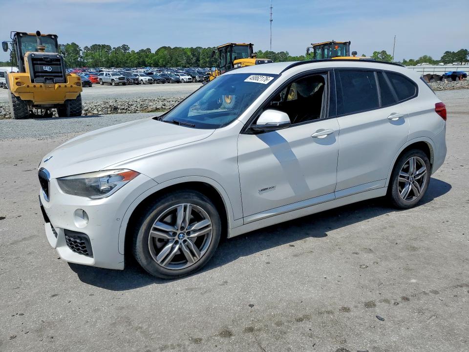 2016 BMW X1 VIN WBXHT3C37G5F66483 — COPART salvage auction photo
